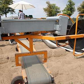 De automatische oogstmachine van Strauss Pack.